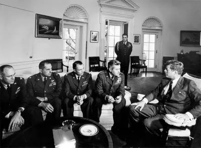 President Kennedy meets in the Oval Office with General Curtis LeMay and reconnaissance pilots who flew the Cuban missions. 